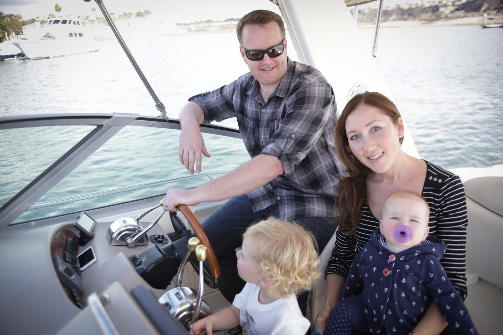 Family in the cockpit at sunset